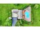 Aerial view of home with a swimming pool, deck, patio, and an extensive lawn area at 4495 W Stones Crossing Rd, Greenwood, IN 46143