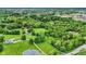 Aerial view of a serene property with lush greenery and a house with long driveway, offering peace and privacy at 4495 W Stones Crossing Rd, Greenwood, IN 46143