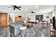 Finished basement with a home office area, workout equipment, and a stylish living space at 4495 W Stones Crossing Rd, Greenwood, IN 46143