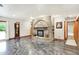 Finished basement boasting a brick fireplace, stylish rug, and polished concrete floors at 4495 W Stones Crossing Rd, Greenwood, IN 46143