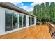 Expansive deck with grill and multiple sliding glass doors, ideal for entertaining at 4495 W Stones Crossing Rd, Greenwood, IN 46143