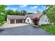 Charming single-Gathering home with a well-manicured lawn, two car garage and brick accents at 4495 W Stones Crossing Rd, Greenwood, IN 46143