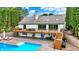 Stunning home with a pool, deck, patio and manicured landscaping, perfect for outdoor living at 4495 W Stones Crossing Rd, Greenwood, IN 46143