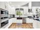 Well-equipped kitchen with stainless appliances, custom cabinets, and modern fixtures at 4495 W Stones Crossing Rd, Greenwood, IN 46143