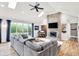 Spacious living room with a vaulted ceiling, fireplace, and comfortable seating at 4495 W Stones Crossing Rd, Greenwood, IN 46143