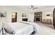 Spacious bedroom with sitting area, fireplace, and ensuite bathroom at 4495 W Stones Crossing Rd, Greenwood, IN 46143