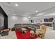 Basement with sectional couch, rec area and kitchenette at 4691 Pascagoula Run, Greenwood, IN 46143