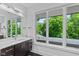 Bright bathroom with modern vanity, and picture window at 4691 Pascagoula Run, Greenwood, IN 46143