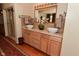 Elegant bathroom featuring a dual vanity, walk-in shower, and tasteful decor for a comfortable and stylish experience at 5135 Moller Rd, Indianapolis, IN 46254