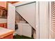 The laundry room is found in a closet with a washing machine, dryer, and shelving at 5135 Moller Rd, Indianapolis, IN 46254