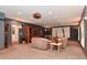 Open living room area with a large built-in entertainment center and comfortable seating at 5135 Moller Rd, Indianapolis, IN 46254