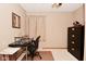 Office with a modern desk, comfortable chair, and neutral paint at 5135 Moller Rd, Indianapolis, IN 46254