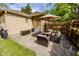 Outdoor living space featuring patio seating, a grill, and green grass at 517 Bernard Ave, Indianapolis, IN 46208