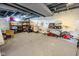 Large basement featuring concrete floors, white-painted brick, and ample storage space at 517 Bernard Ave, Indianapolis, IN 46208