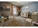 Cozy bedroom featuring neutral walls and carpet with baby furniture and decor at 517 Bernard Ave, Indianapolis, IN 46208