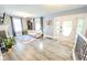 Bright and airy living room boasting stylish flooring, a fireplace, and an open layout at 517 Bernard Ave, Indianapolis, IN 46208
