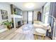 Inviting living room featuring modern decor, a fireplace, and comfortable seating at 517 Bernard Ave, Indianapolis, IN 46208
