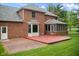 View of the backyard and deck showcasing the screened in porch at 5313 Redbird Dr, Columbus, IN 47201