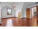 Bedroom features hardwood floors, closet space, and a window that provides ample natural light and scenic views at 5313 Redbird Dr, Columbus, IN 47201