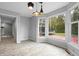 Sun-filled breakfast nook featuring large windows overlooking the backyard and a view to the side patio at 5313 Redbird Dr, Columbus, IN 47201