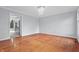 The living room features wood floors, decorative ceiling trim, and ample natural light at 5313 Redbird Dr, Columbus, IN 47201
