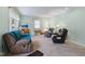 Inviting living room with cozy seating, a TV, and natural light at 5326 Brazos Dr, Indianapolis, IN 46237