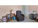 Comfortable office with books and natural light is the perfect place to focus and stay organized at 5326 Brazos Dr, Indianapolis, IN 46237