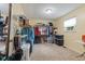 A large walk-in closet features ample hanging space, open shelving, and a window for natural light at 5326 Brazos Dr, Indianapolis, IN 46237