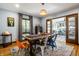 Stylish dining room with a large wooden table and decorative rug at 5401 N New Jersey St, Indianapolis, IN 46220