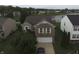 Aerial shot of home near pond showcasing backyard space and neighborhood at 5502 Floating Leaf Dr, Indianapolis, IN 46237