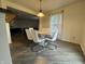 A stylish dining area featuring a modern table with seating for six at 5502 Floating Leaf Dr, Indianapolis, IN 46237