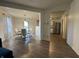 Bright dining room featuring modern table, chairs, and hardwood flooring at 5502 Floating Leaf Dr, Indianapolis, IN 46237