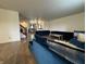 Expansive living room featuring a modern design and hardwood flooring at 5502 Floating Leaf Dr, Indianapolis, IN 46237