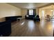 Open-concept living area with hardwood floors, comfortable seating and natural light at 5502 Floating Leaf Dr, Indianapolis, IN 46237