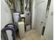 The utility room features a water heater, water softener, and other equipment at 5502 Floating Leaf Dr, Indianapolis, IN 46237