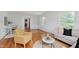Spacious living room with lots of natural light, hardwood flooring, and neutral colored walls at 6030 Riverview Dr, Indianapolis, IN 46208