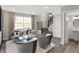 Bright living room with large windows and modern decor at 6574 Halsey St, Zionsville, IN 46077