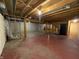 Spacious unfinished basement with exposed beams offers potential for customization and added living space at 6609 N Tuxedo Ln, Indianapolis, IN 46220