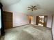 Spacious main bedroom with built-in shelving and access to ensuite bathroom at 6609 N Tuxedo Ln, Indianapolis, IN 46220