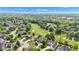 An aerial view of a neighborhood with golf course access at 6610 Royal Oakland Dr, Indianapolis, IN 46236