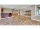 Spacious finished basement with hardwood floors and recessed lighting at 6610 Royal Oakland Dr, Indianapolis, IN 46236