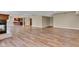 Spacious basement with a fireplace and wet bar, ready for entertaining guests at 6610 Royal Oakland Dr, Indianapolis, IN 46236