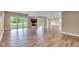 Large basement with fireplace and glass doors leading to the backyard at 6610 Royal Oakland Dr, Indianapolis, IN 46236