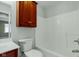 Bathroom featuring a vanity, a toilet, and a shower-tub combination at 6610 Royal Oakland Dr, Indianapolis, IN 46236