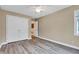 Bedroom featuring closet and laminate flooring at 6610 Royal Oakland Dr, Indianapolis, IN 46236