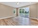 Bright bedroom with sliding glass doors to a deck and neutral walls, offering a relaxing retreat at 6610 Royal Oakland Dr, Indianapolis, IN 46236