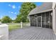 Spacious deck featuring a screened-in porch, perfect for relaxing and entertaining while enjoying outdoor views at 6610 Royal Oakland Dr, Indianapolis, IN 46236