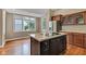 Eat-in kitchen with center island, and natural light from windows at 6610 Royal Oakland Dr, Indianapolis, IN 46236