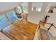 Bright and airy living room boasts hardwood floors, fireplace and slider door to deck at 6610 Royal Oakland Dr, Indianapolis, IN 46236