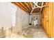 Unfinished basement space with exposed ceiling and concrete walls, perfect for customization at 6610 Royal Oakland Dr, Indianapolis, IN 46236